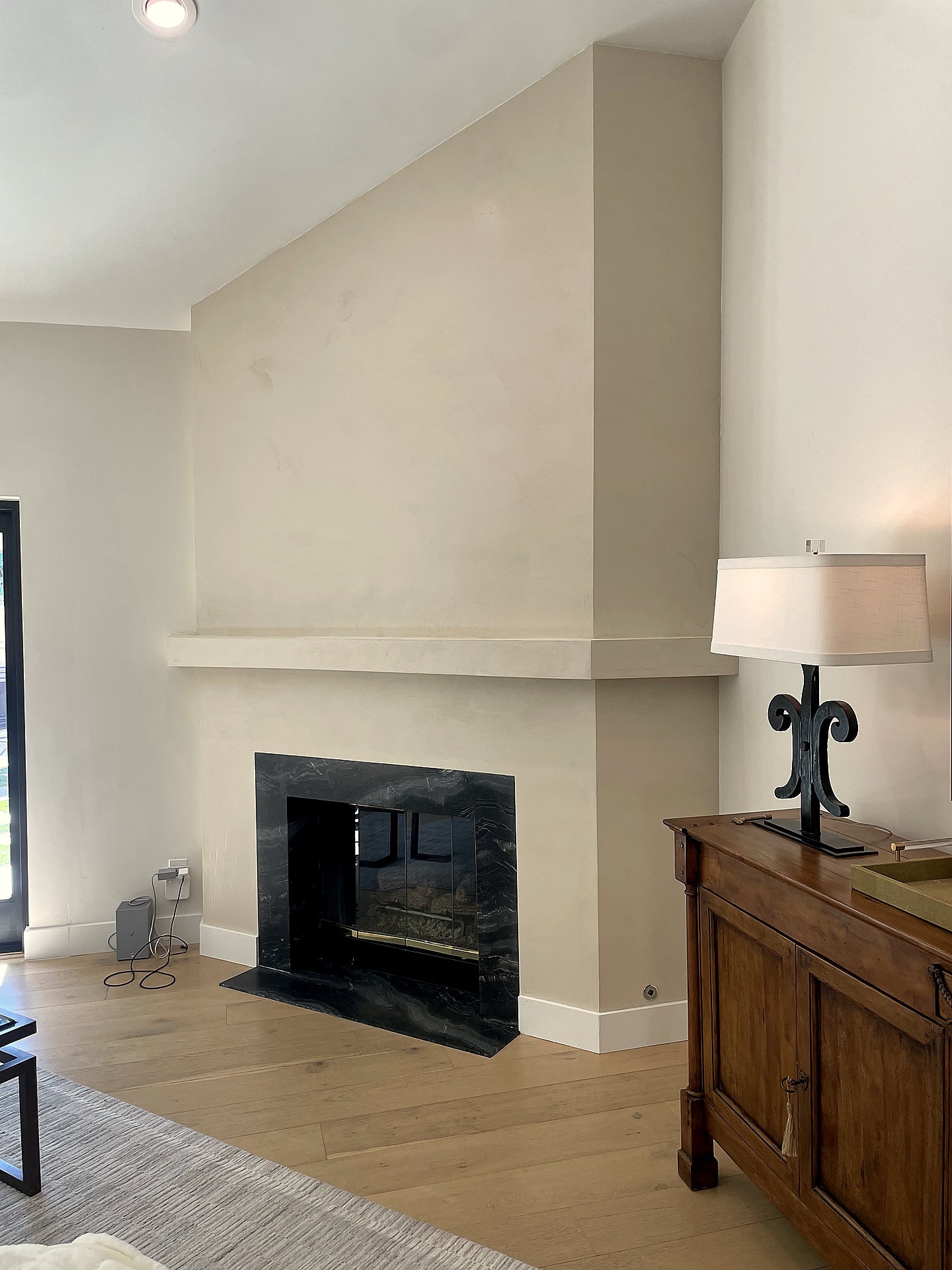 Roman clay plaster fireplace and living room