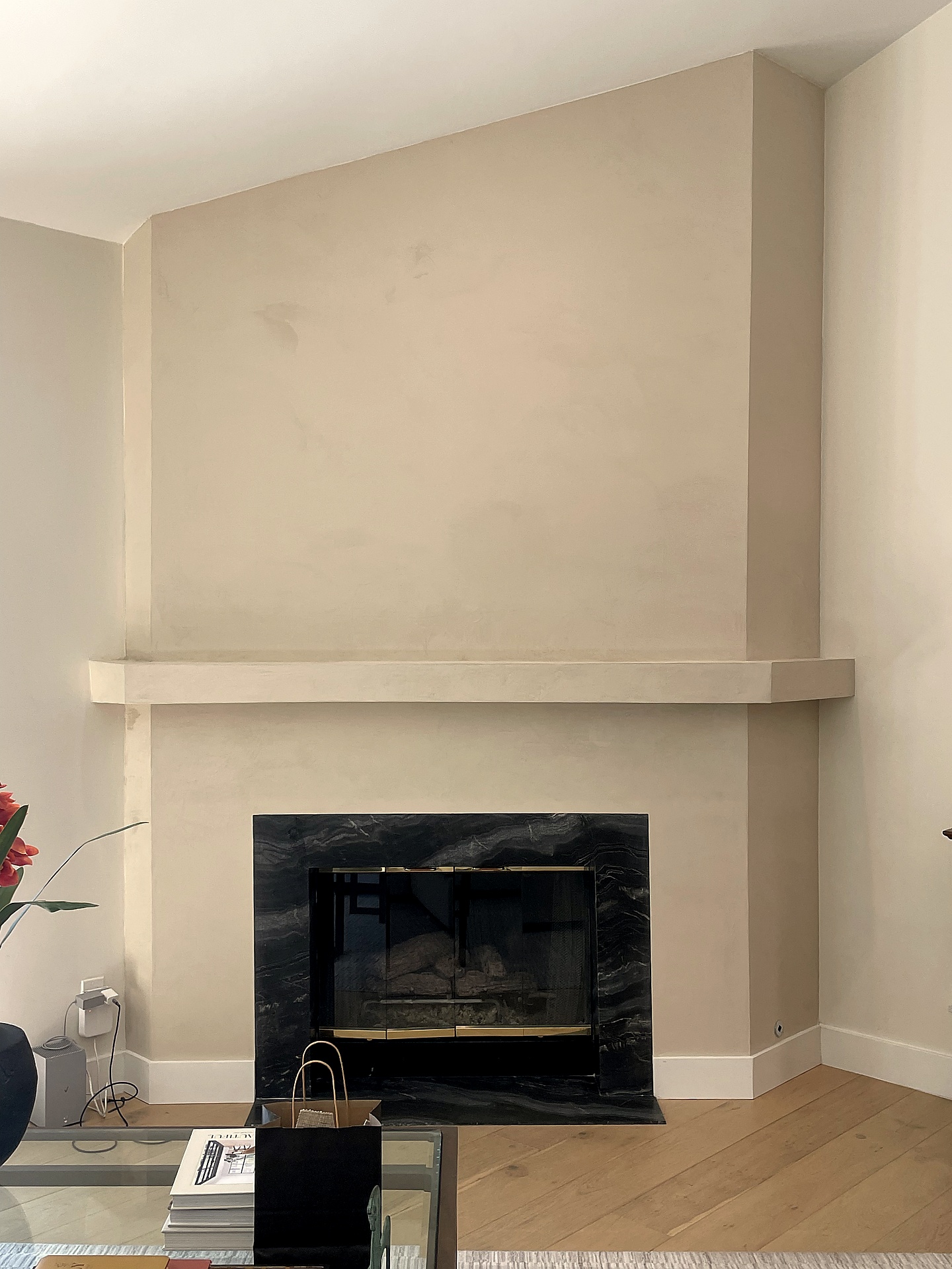Roman clay plaster fireplace surround close-up