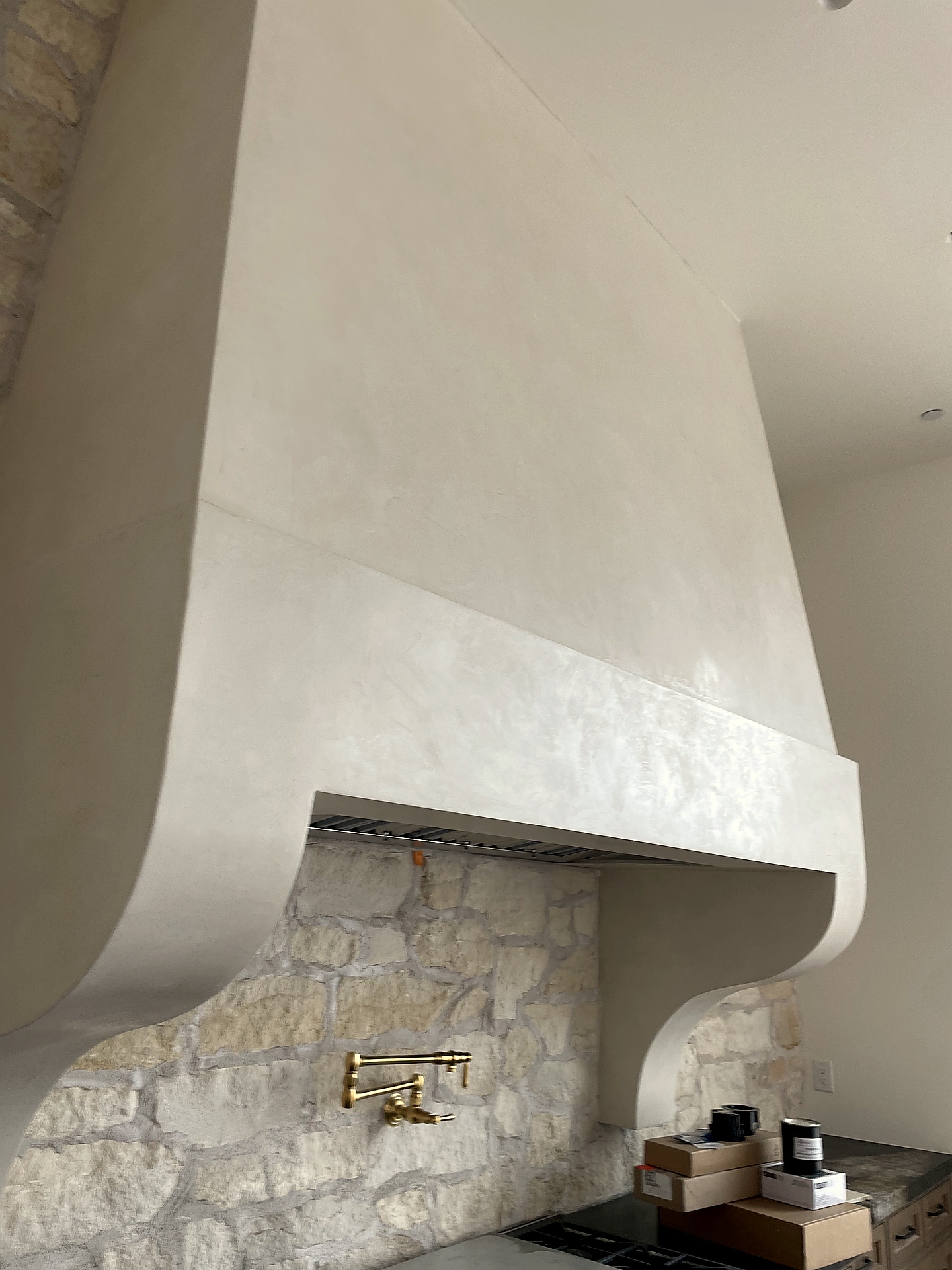 Roman clay plaster custom range hood