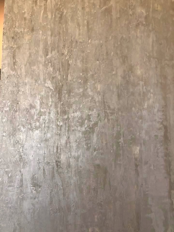 Grey Venetian plaster wall close-up