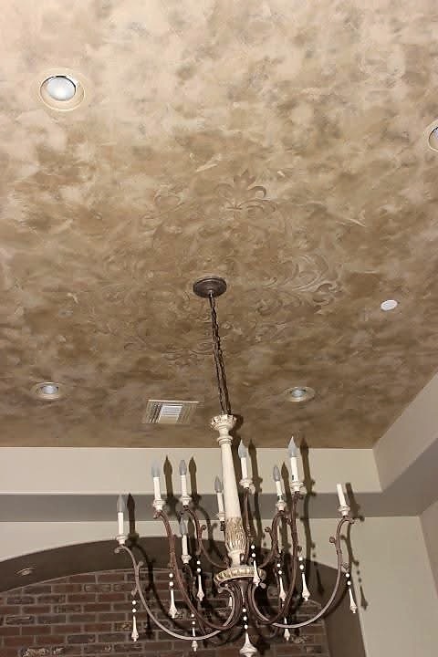 Venetian plaster ceiling with chandelier